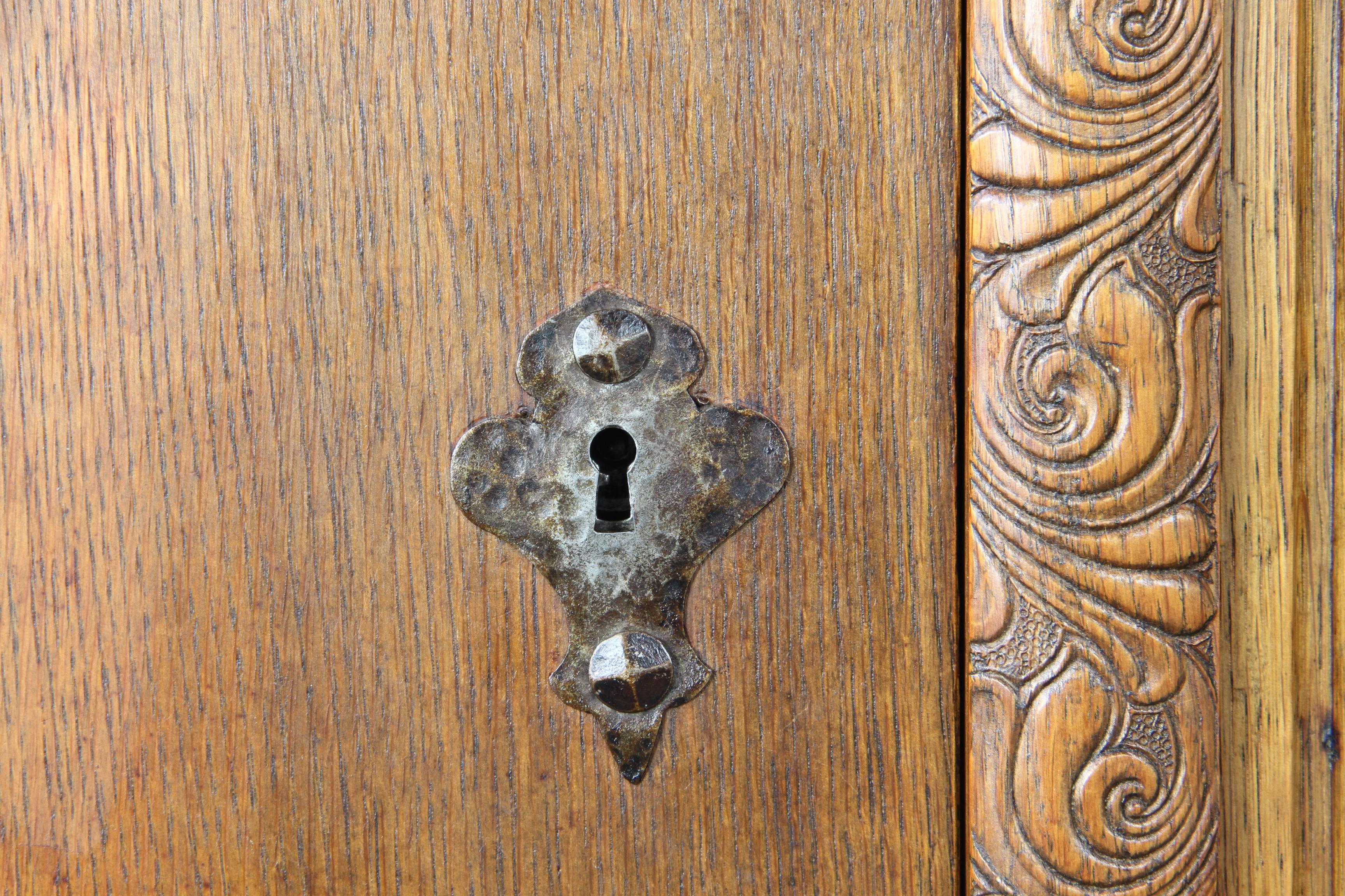 Danish_Brutalist_Oak_Cabinet_with_Carved_Diamond_Details,_Attributed_to_Henning_Kjærnulf,_1960s