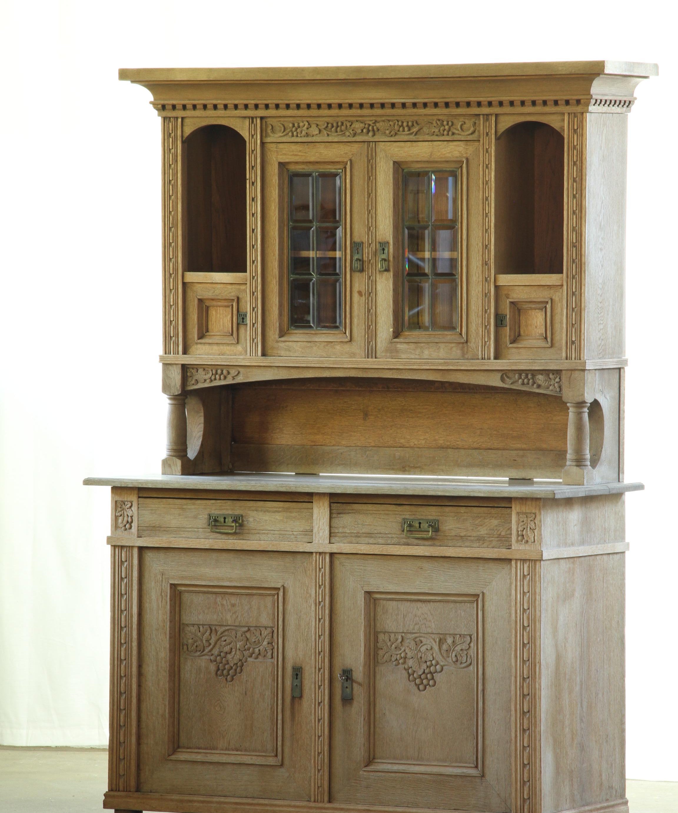 Antique_Danish_Oak_and_Pine_Buffet_Cabinet_with_Carved_Grape_Motifs_and_Glass_Doors,_19th_Century