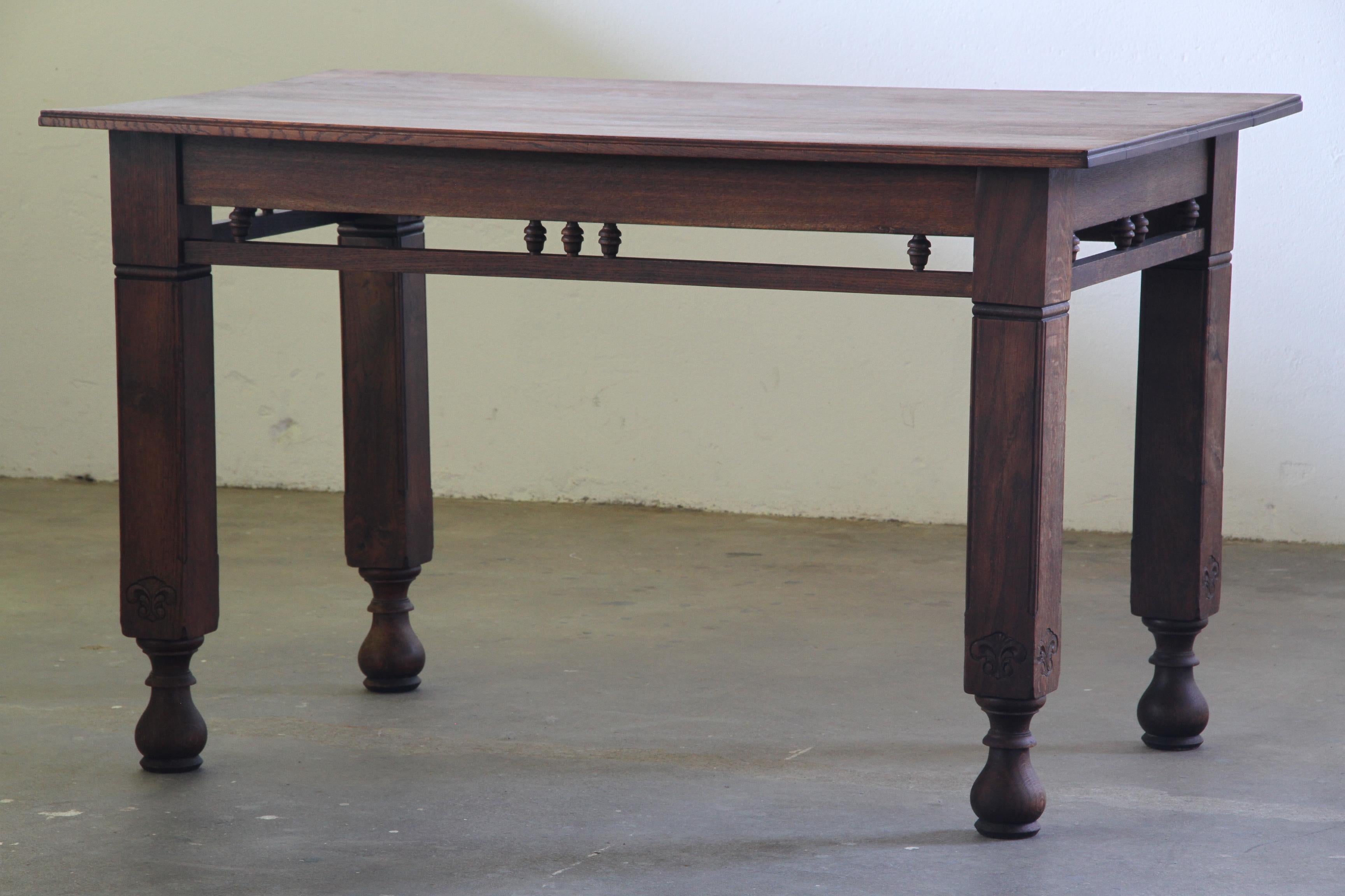 Antique_Danish_Solid_Oak_Farmhouse_Table_with_Hand-Carved_Legs,_Early_20th_Century