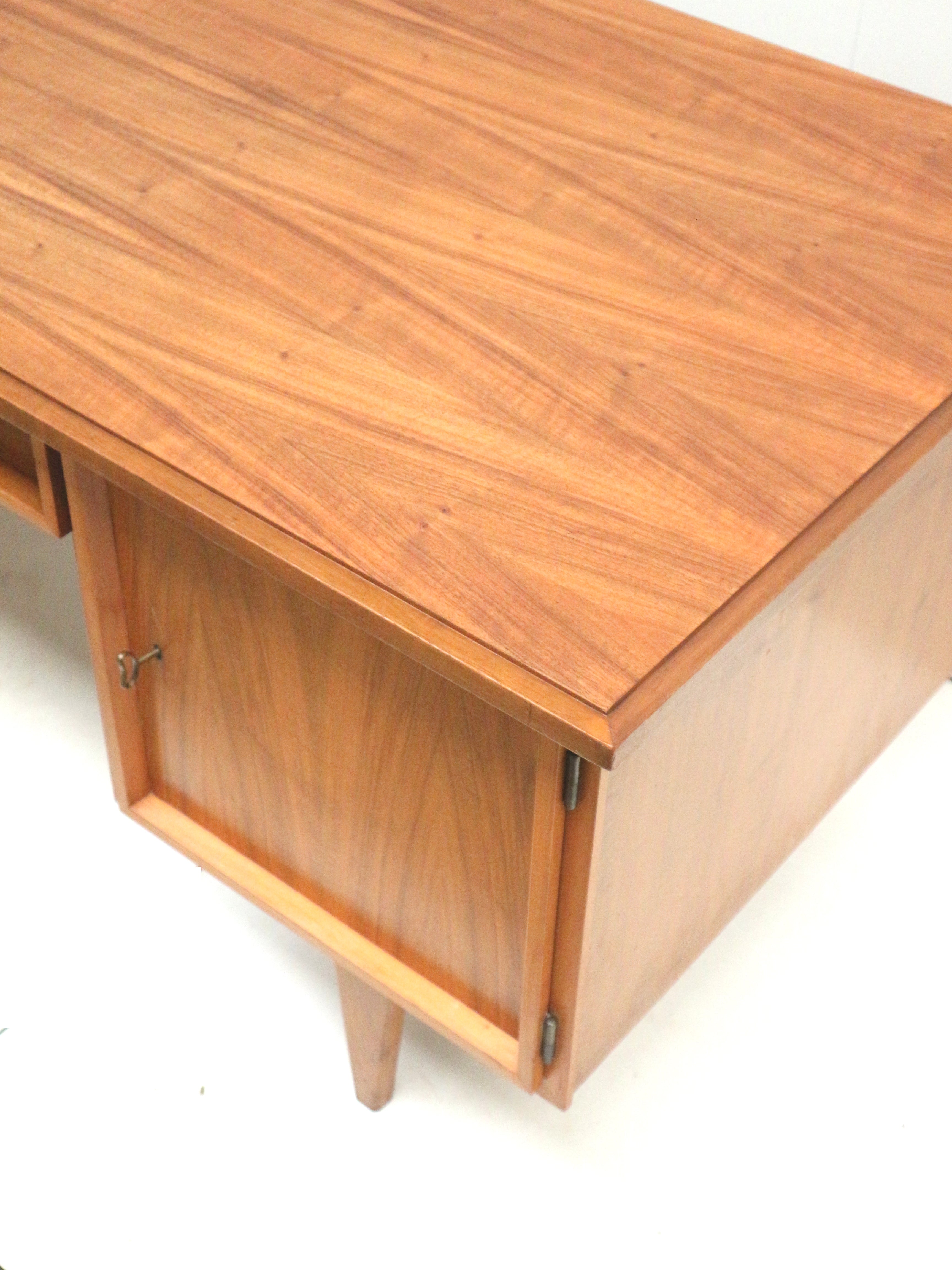 Vintage_executive_desk_with_doors_and_drawers_from_the_1960s