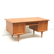 Vintage_executive_desk_with_doors_and_drawers_from_the_1960s