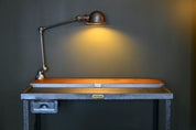 Vintage_industrial_desk_with_Jieldé_lamp