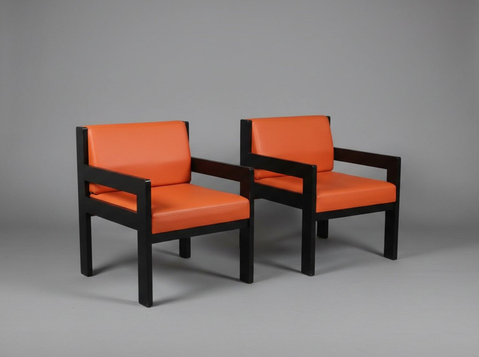 Set_of_2_Vintage_Lounge_Chairs_in_Black_Wood_and_Orange_Vinyl,_1970s–80s