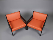 Set_of_2_Vintage_Lounge_Chairs_in_Black_Wood_and_Orange_Vinyl,_1970s–80s