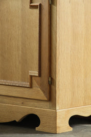 Danish_Brutalist_Solid_Oak_Sideboard_with_Carved_Doors_and_Three_Drawers,_Attributed_to_Henning_Kjærnulf,_1960s