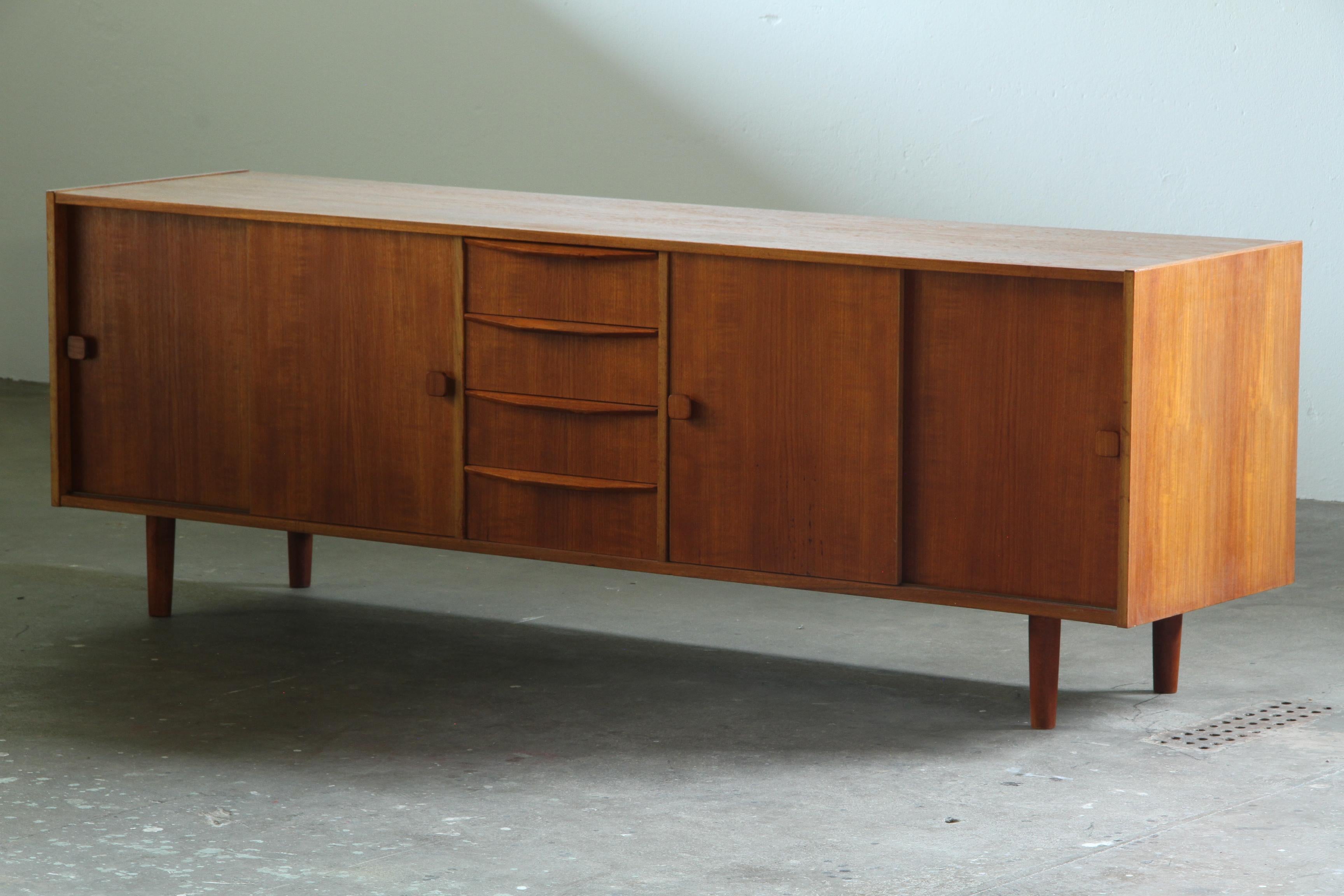 Danish_Mid-Century_Teak_Sideboard_with_Four_Drawers_and_Tapered_Legs,_1960s