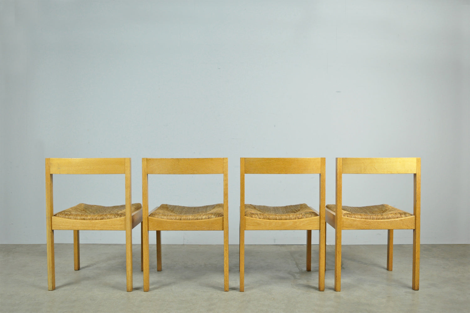 Set_of_4_Vintage_oak_with_wicker_dining_chairs_by_Gerard_Geytenbeek,_1960s