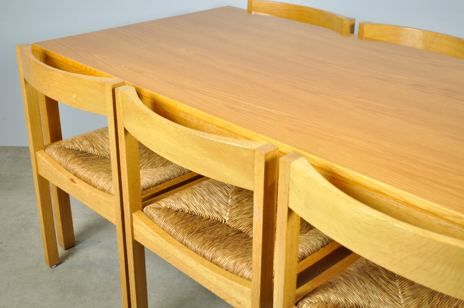 Set_of_4_Vintage_oak_with_wicker_dining_chairs_by_Gerard_Geytenbeek,_1960s