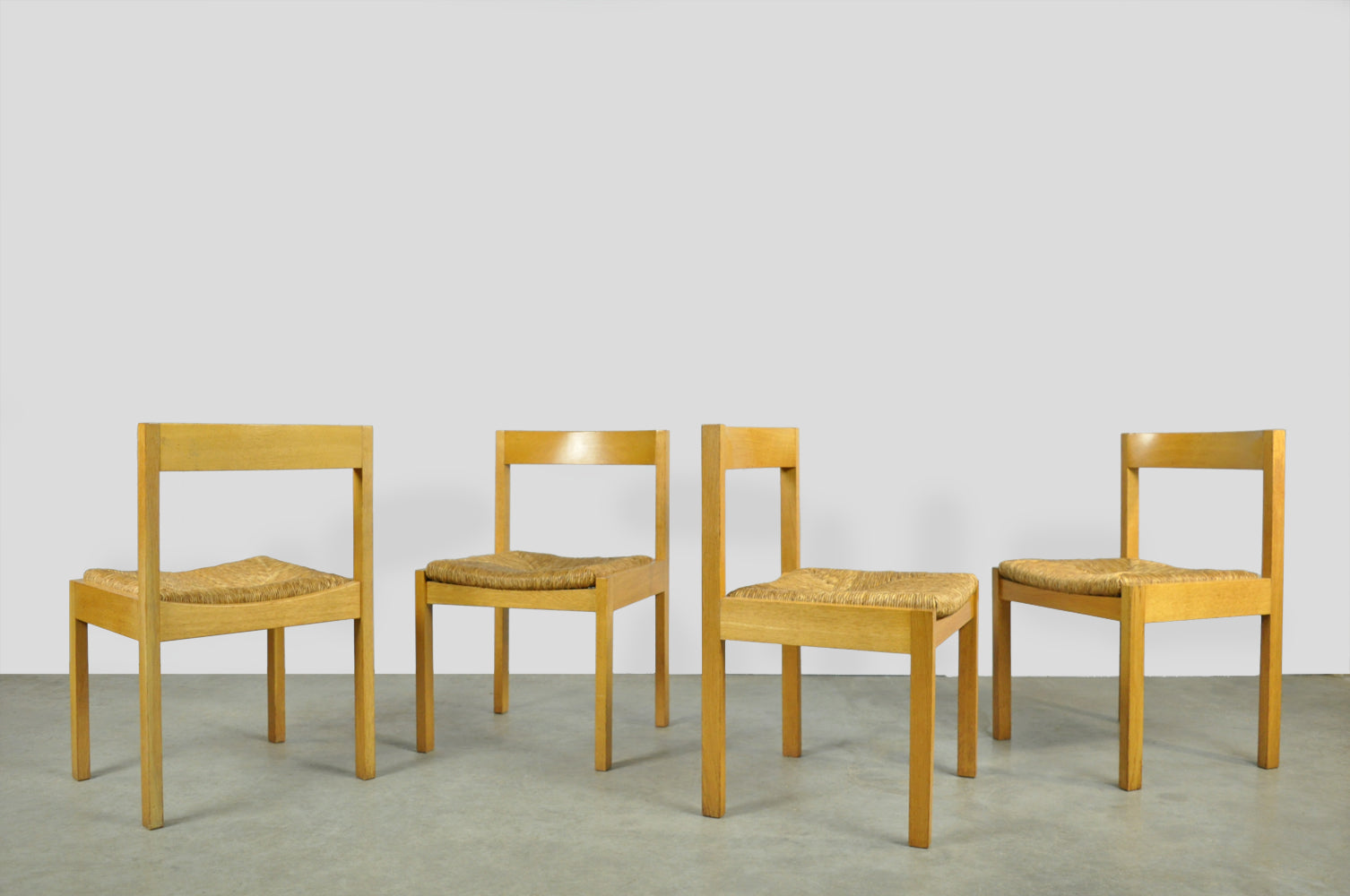 Set_of_4_Vintage_oak_with_wicker_dining_chairs_by_Gerard_Geytenbeek,_1960s