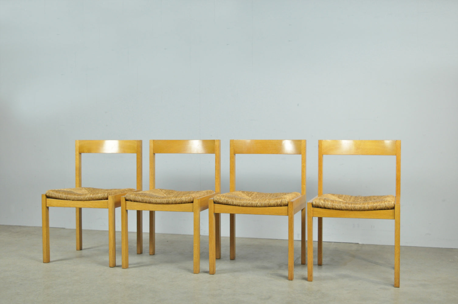 Set_of_4_Vintage_oak_with_wicker_dining_chairs_by_Gerard_Geytenbeek,_1960s