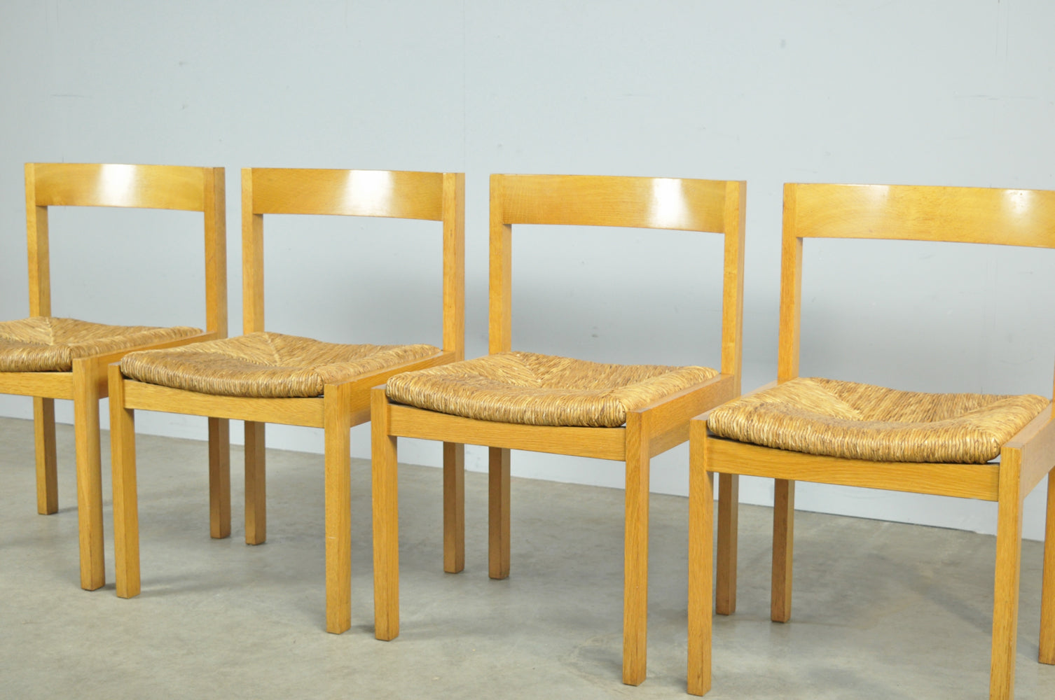 Set_of_4_Vintage_oak_with_wicker_dining_chairs_by_Gerard_Geytenbeek,_1960s
