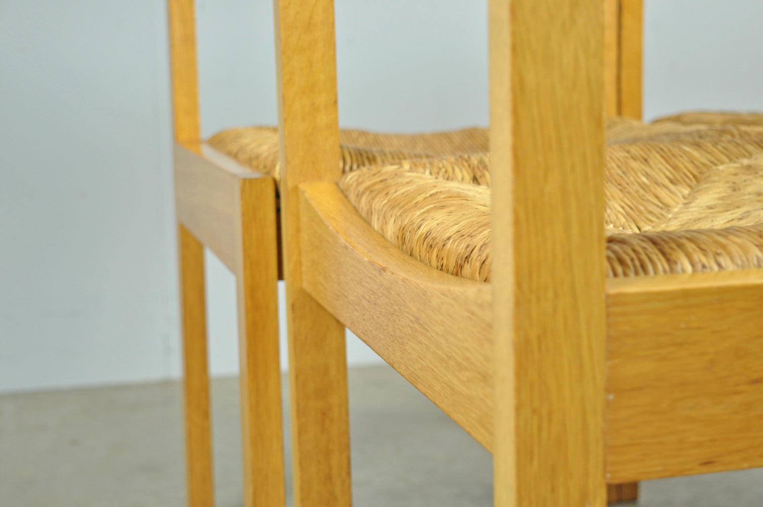 Set_of_4_Vintage_oak_with_wicker_dining_chairs_by_Gerard_Geytenbeek,_1960s