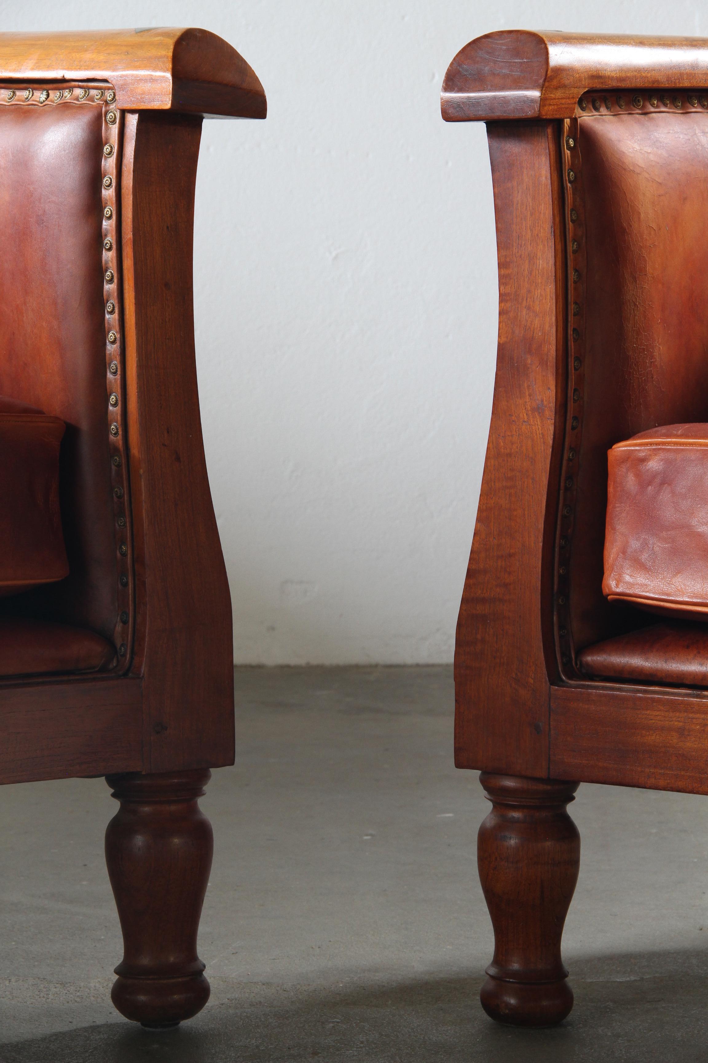 Set_of_2_Antique_Leather_Club_Armchairs_with_Curved_Armrests,_Art_Deco_Style,_Early_20th_Century