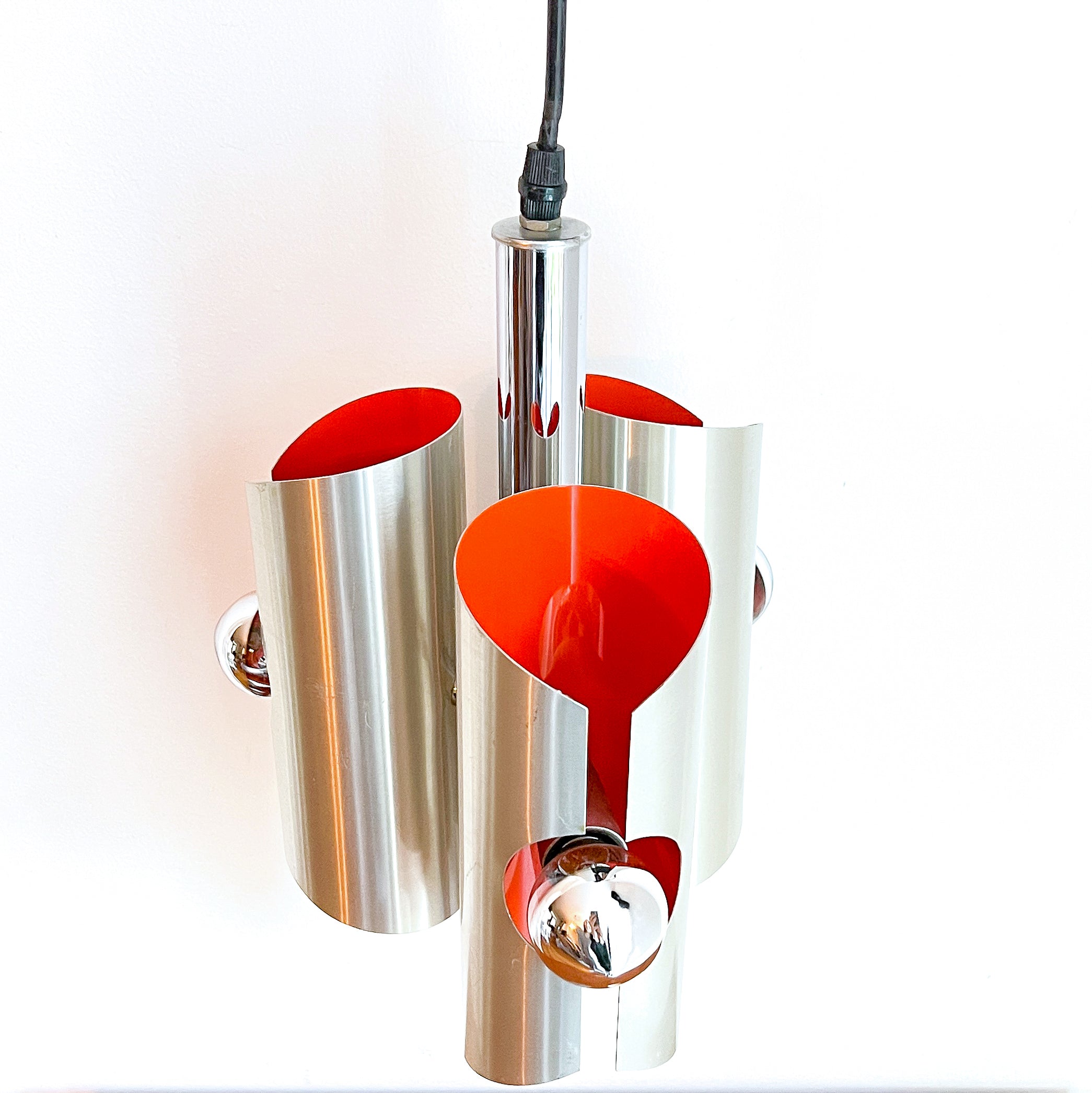 Space_Age_Chrome_Pendant_Lamp_by_Polam_with_Orange_Interior,_1960s