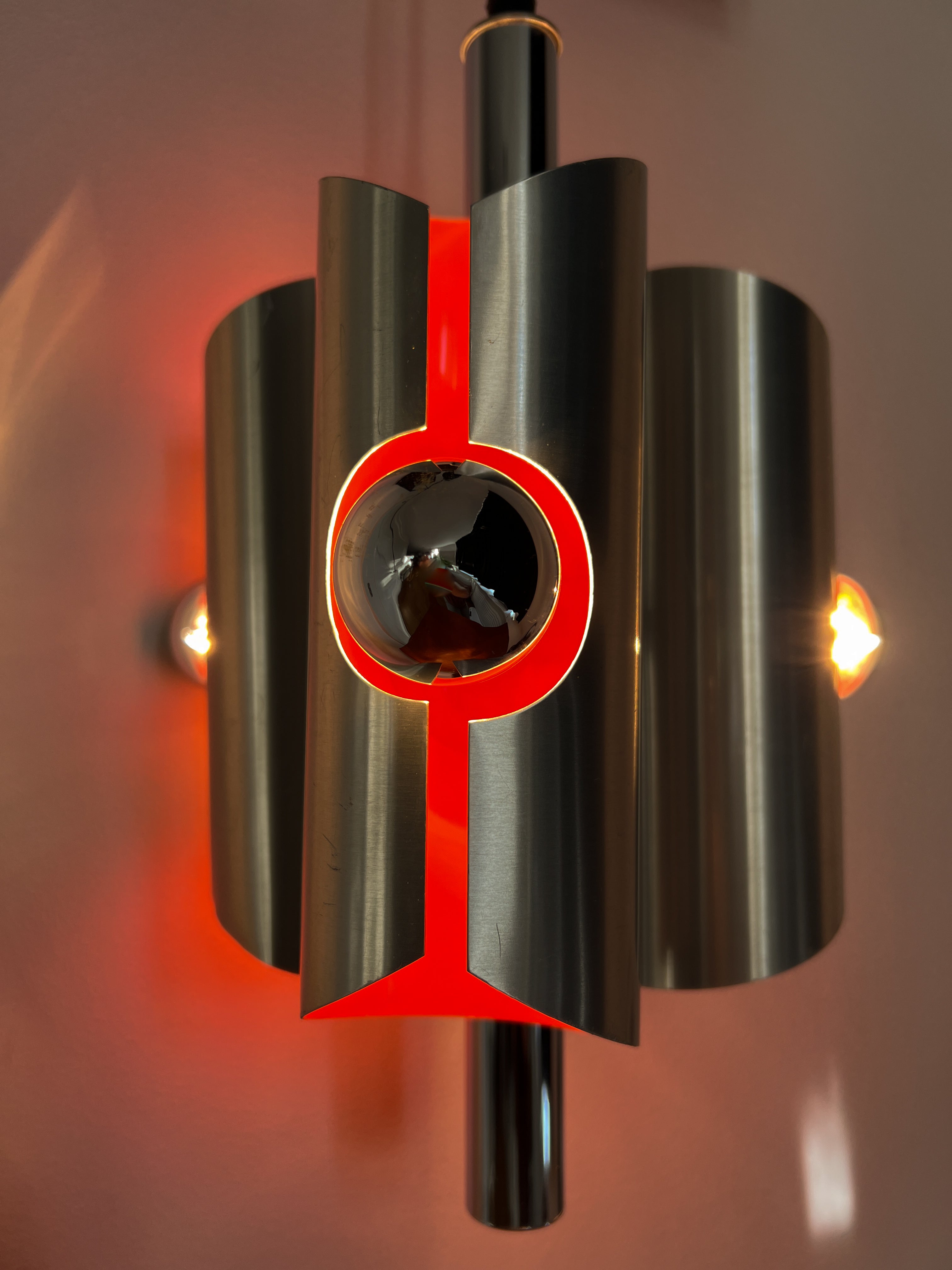 Space_Age_Chrome_Pendant_Lamp_by_Polam_with_Orange_Interior,_1960s