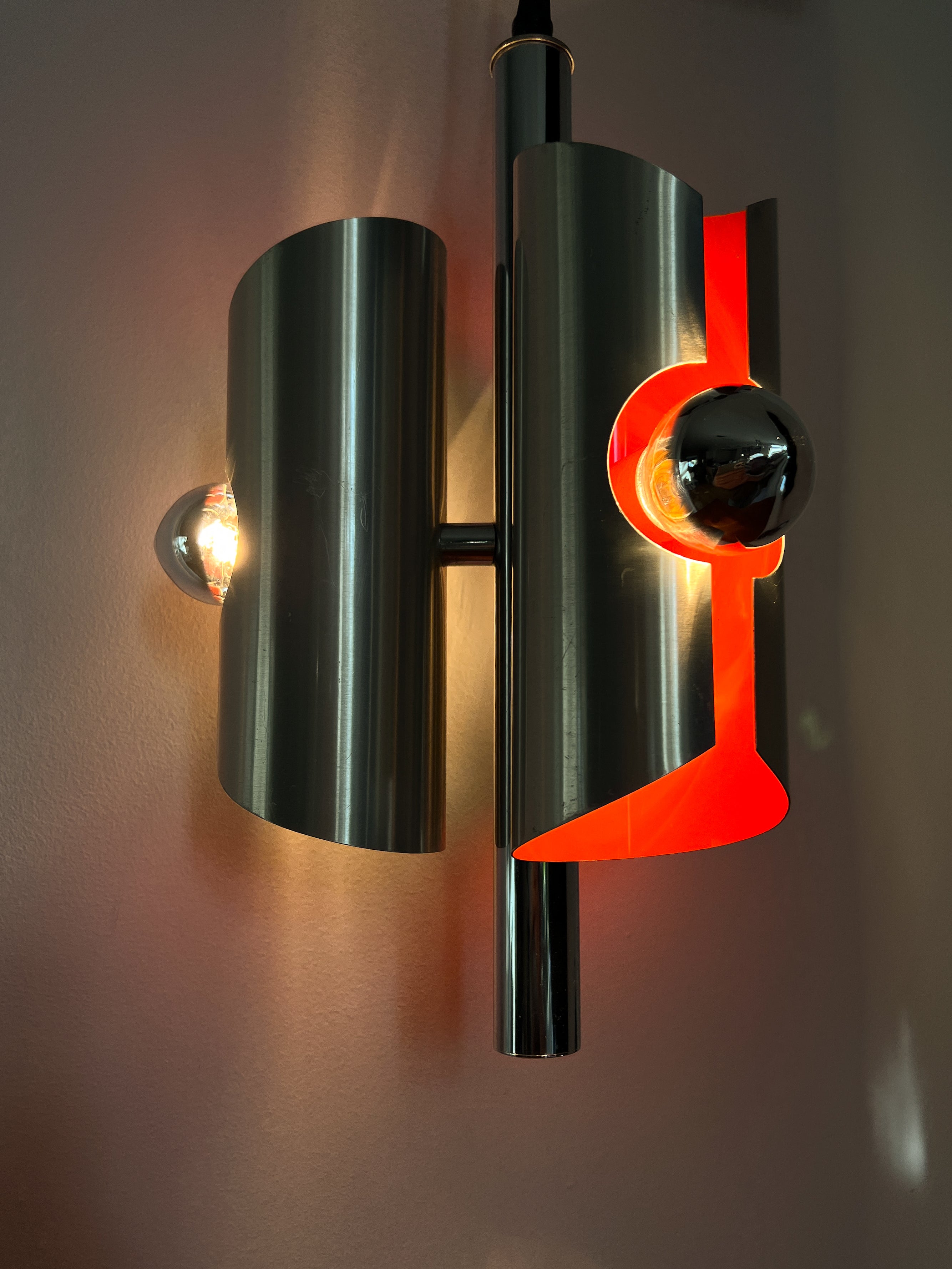 Space_Age_Chrome_Pendant_Lamp_by_Polam_with_Orange_Interior,_1960s