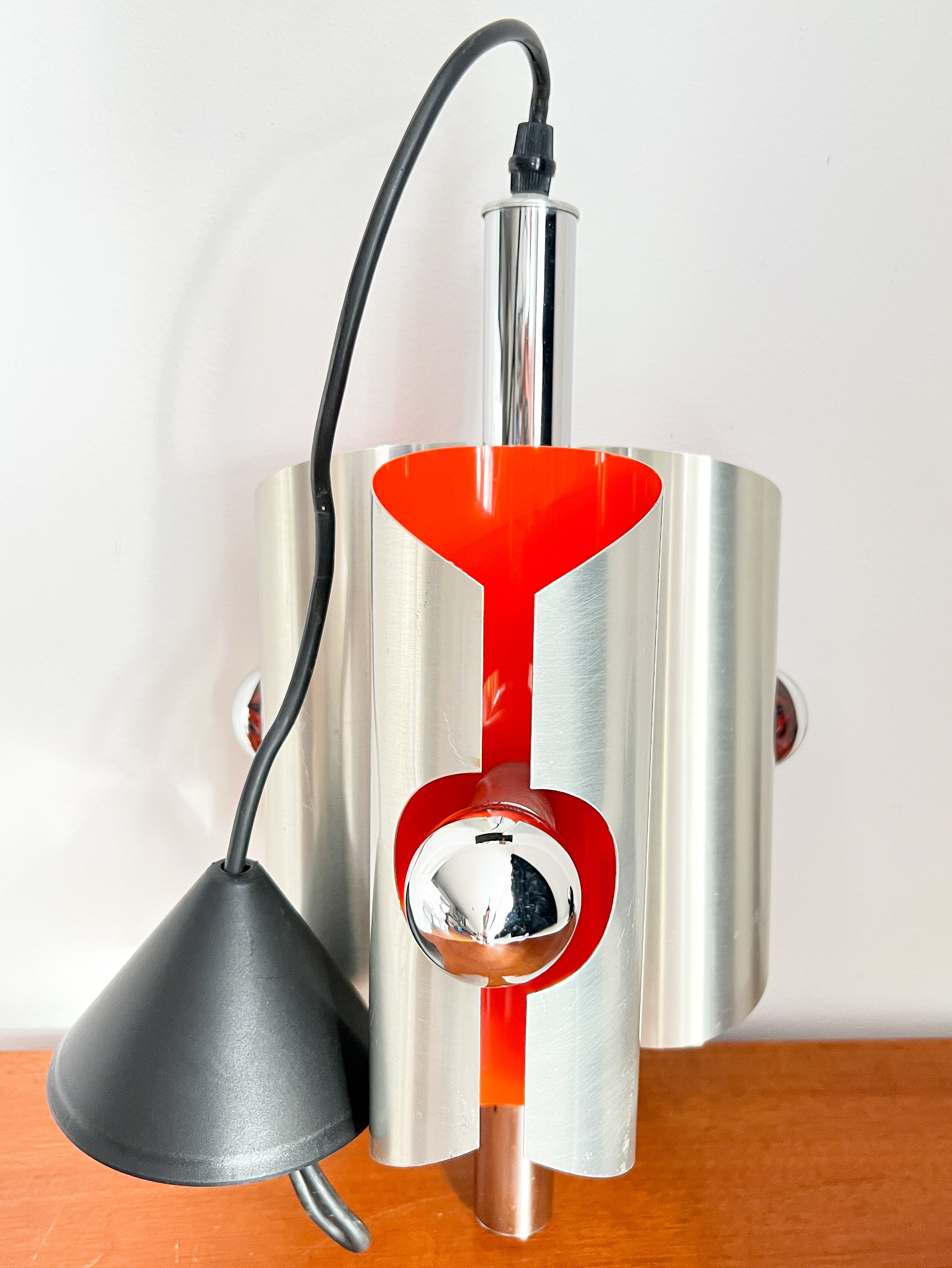 Space_Age_Chrome_Pendant_Lamp_by_Polam_with_Orange_Interior,_1960s