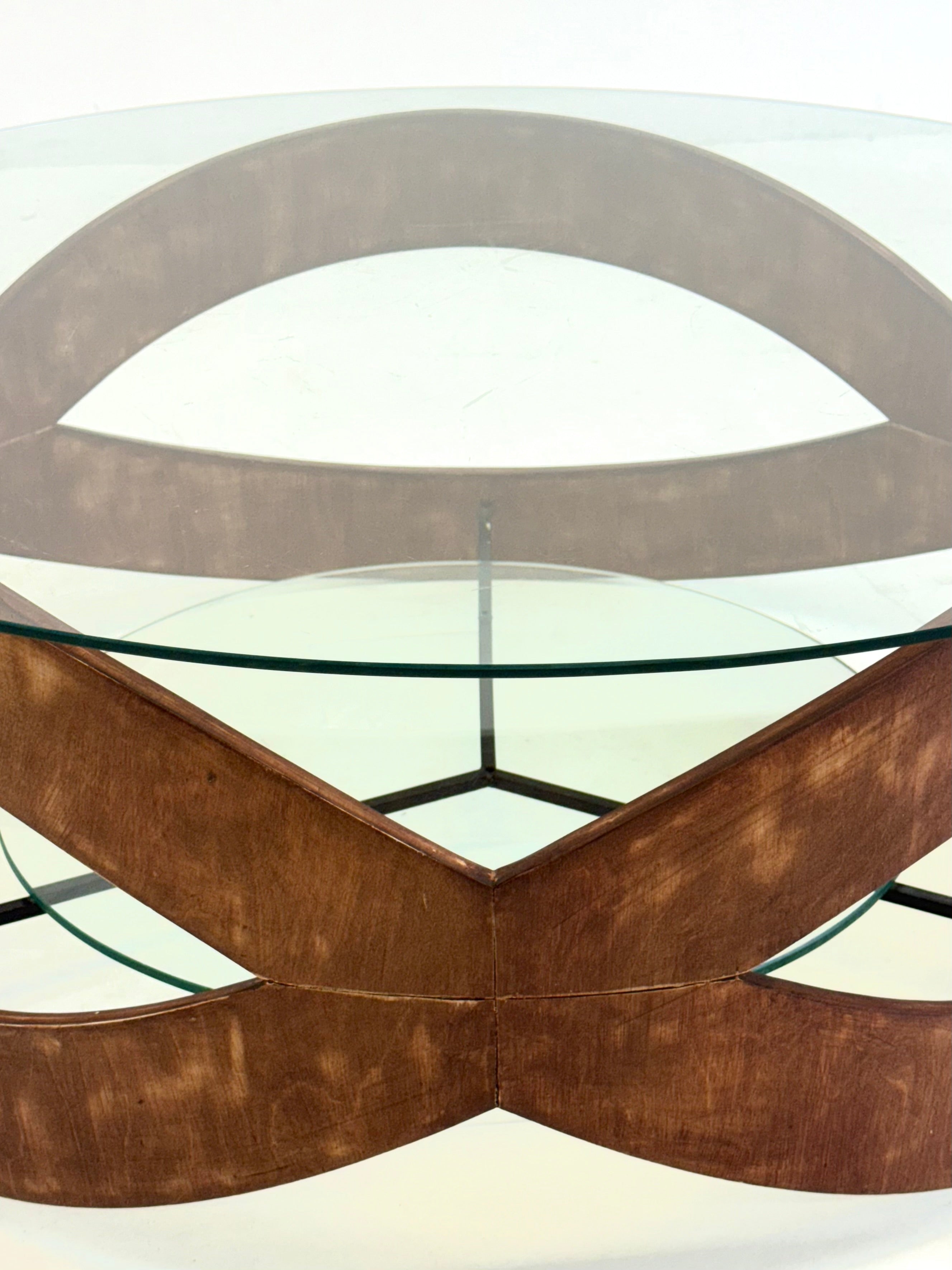 Vintage_round_coffee_table_with_sculptural_wooden_frame