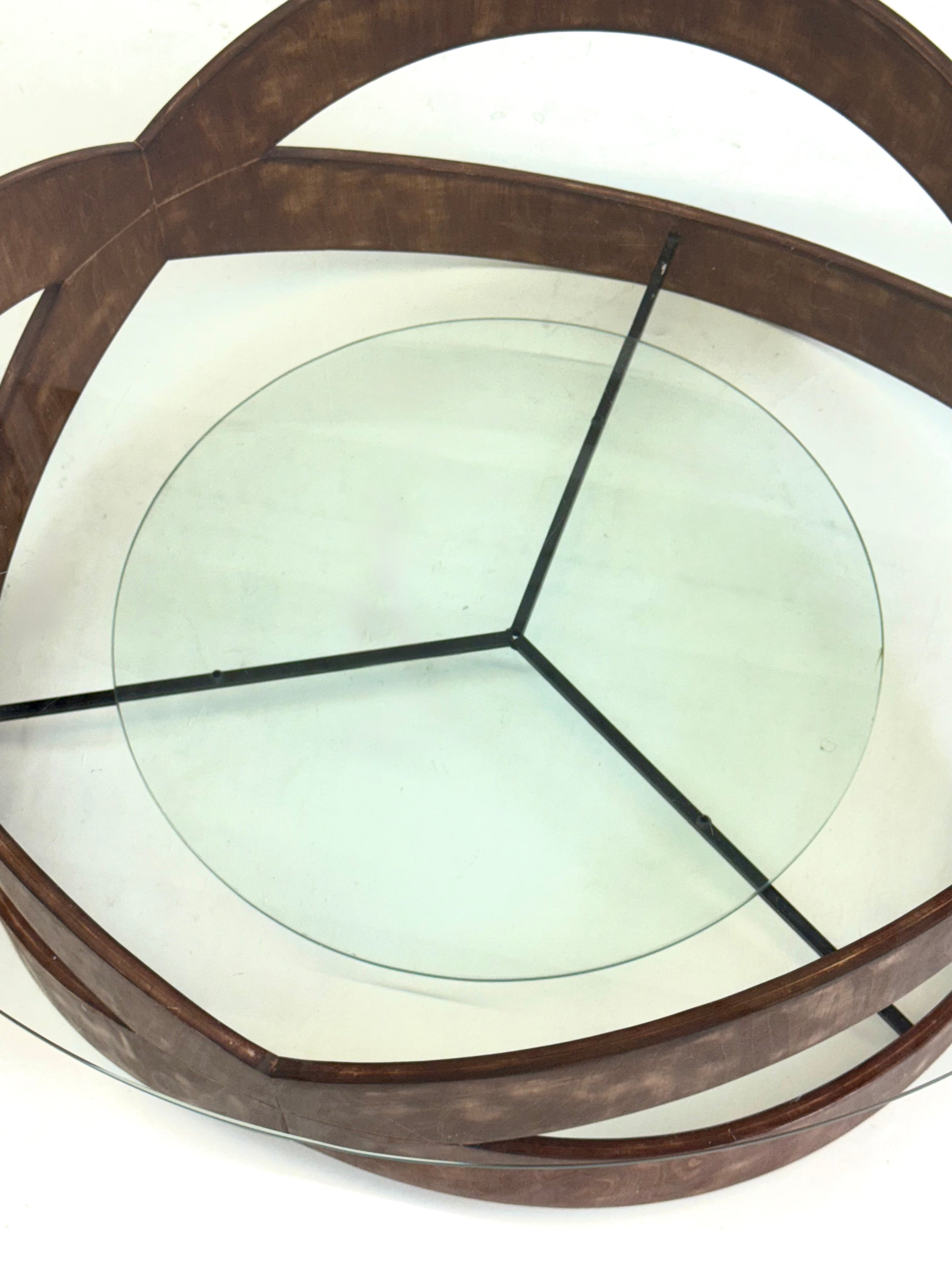 Vintage_round_coffee_table_with_sculptural_wooden_frame