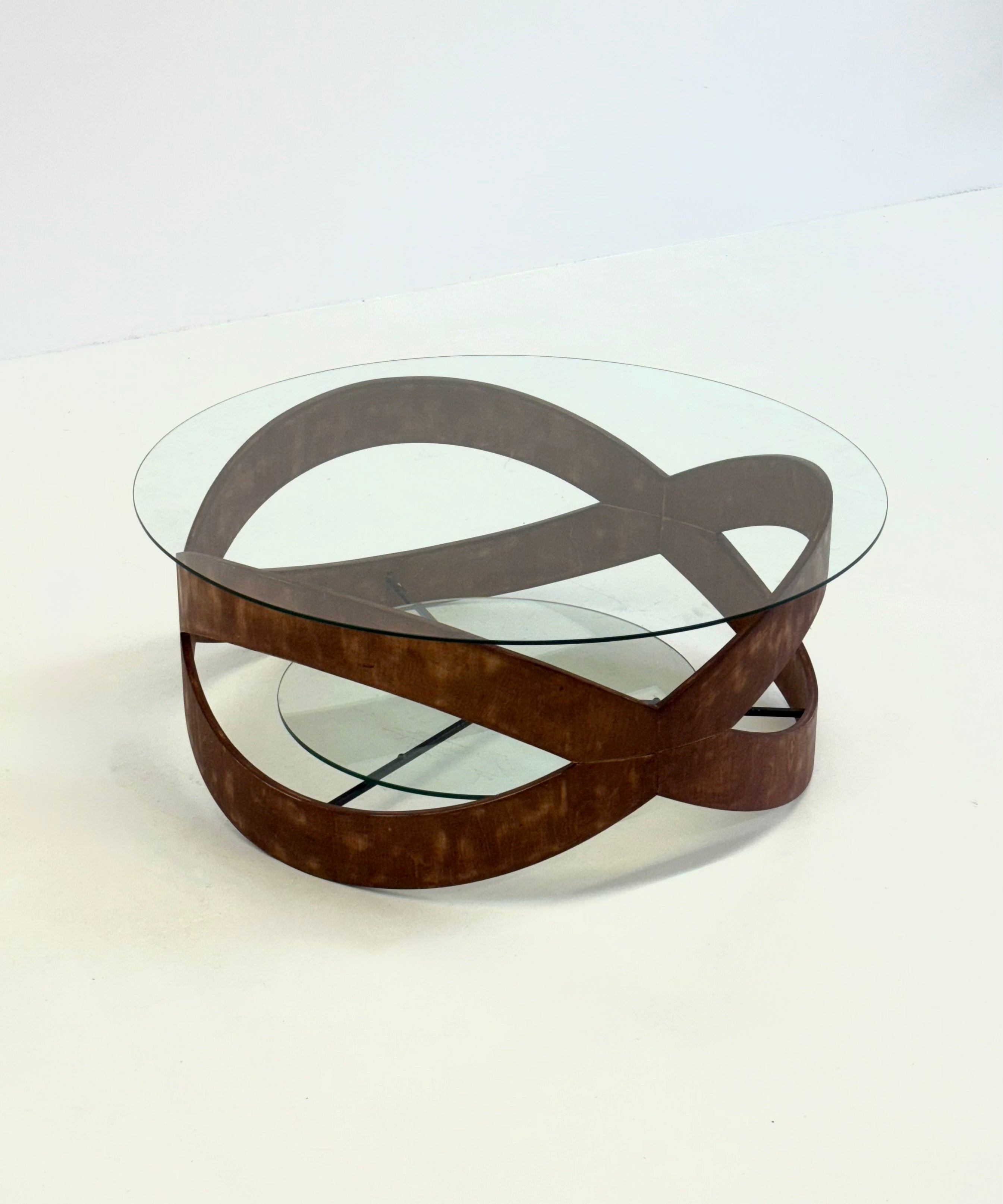 Vintage_round_coffee_table_with_sculptural_wooden_frame