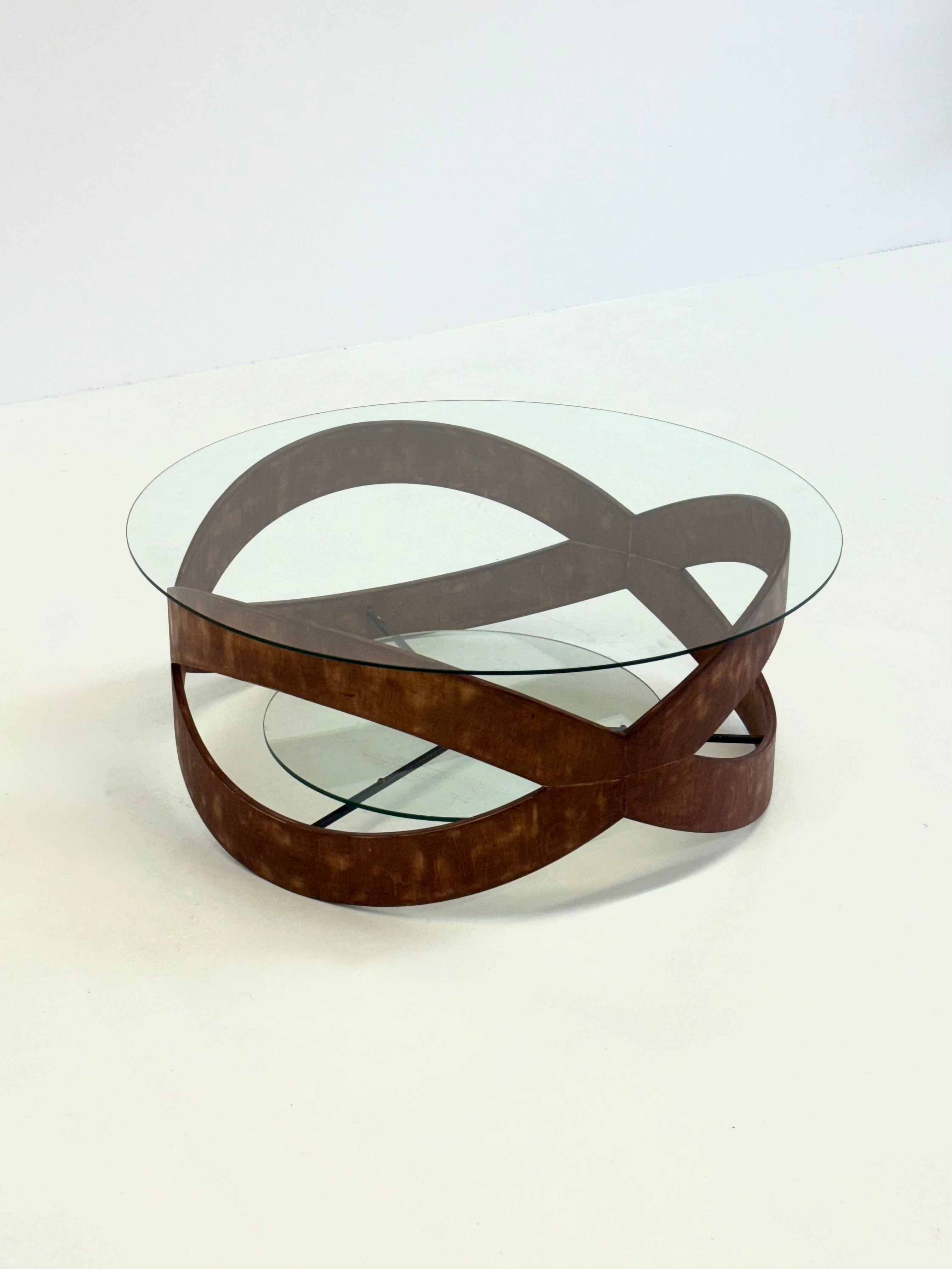 Vintage_round_coffee_table_with_sculptural_wooden_frame