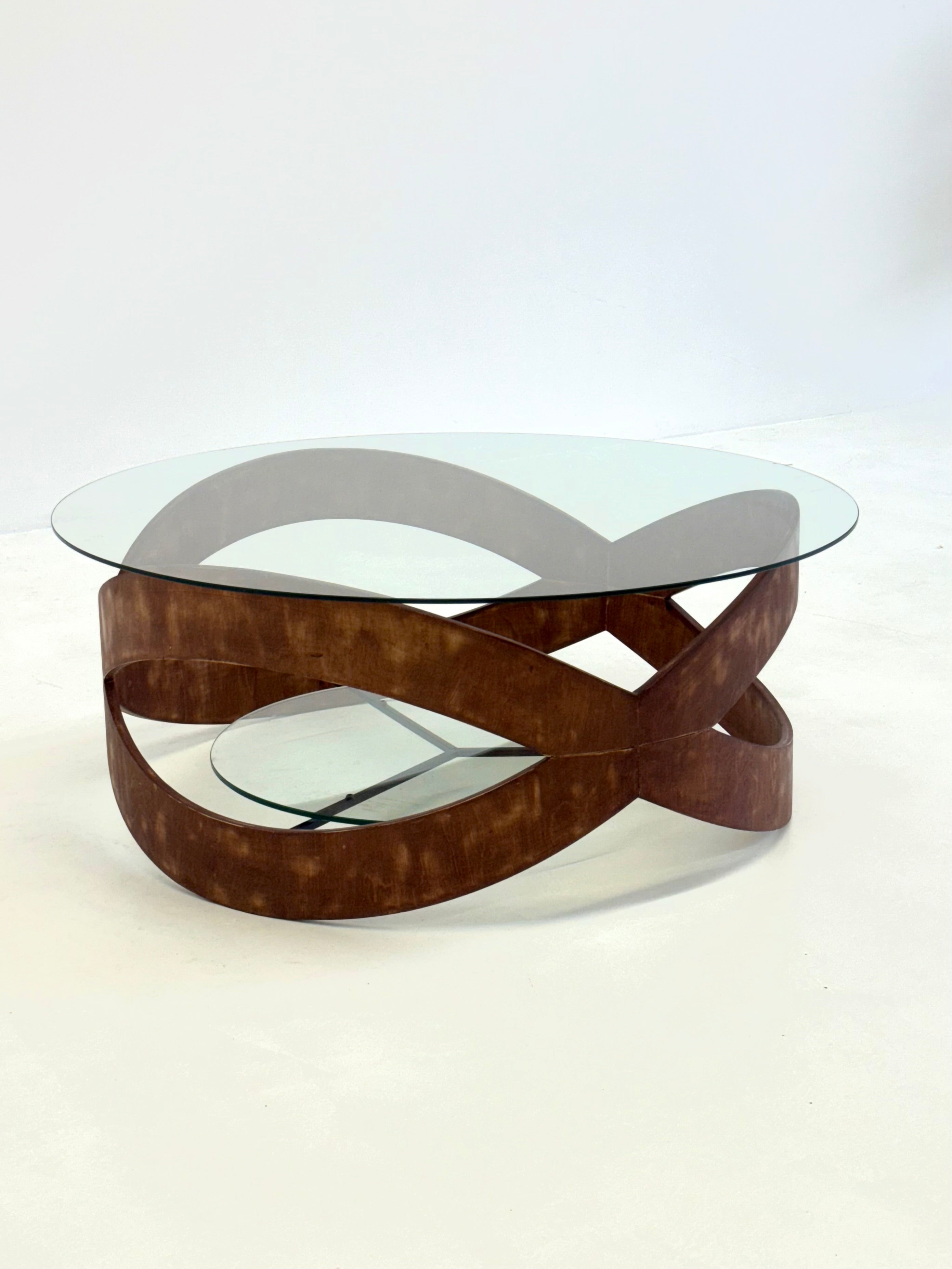 Vintage_round_coffee_table_with_sculptural_wooden_frame