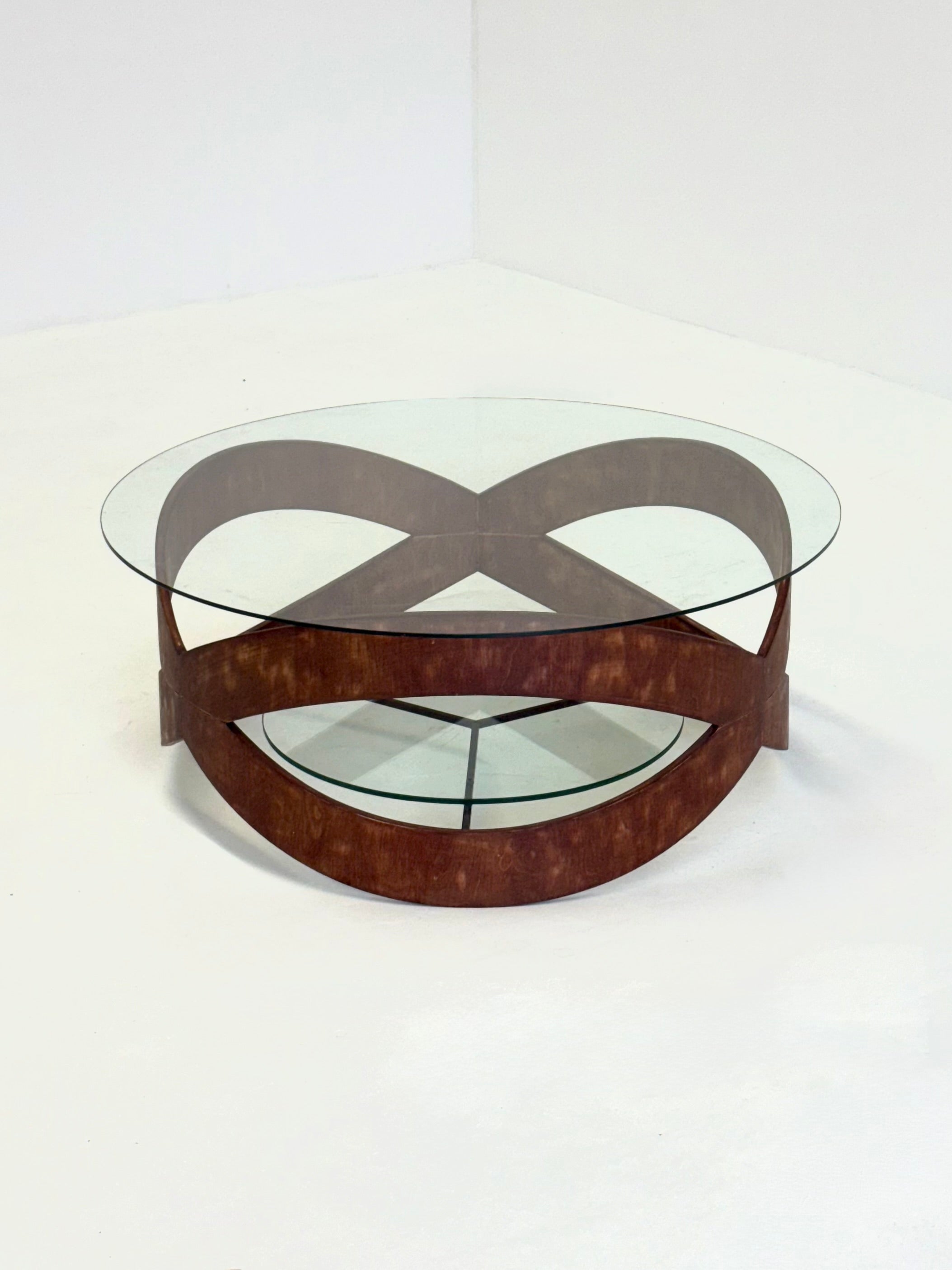 Vintage_round_coffee_table_with_sculptural_wooden_frame