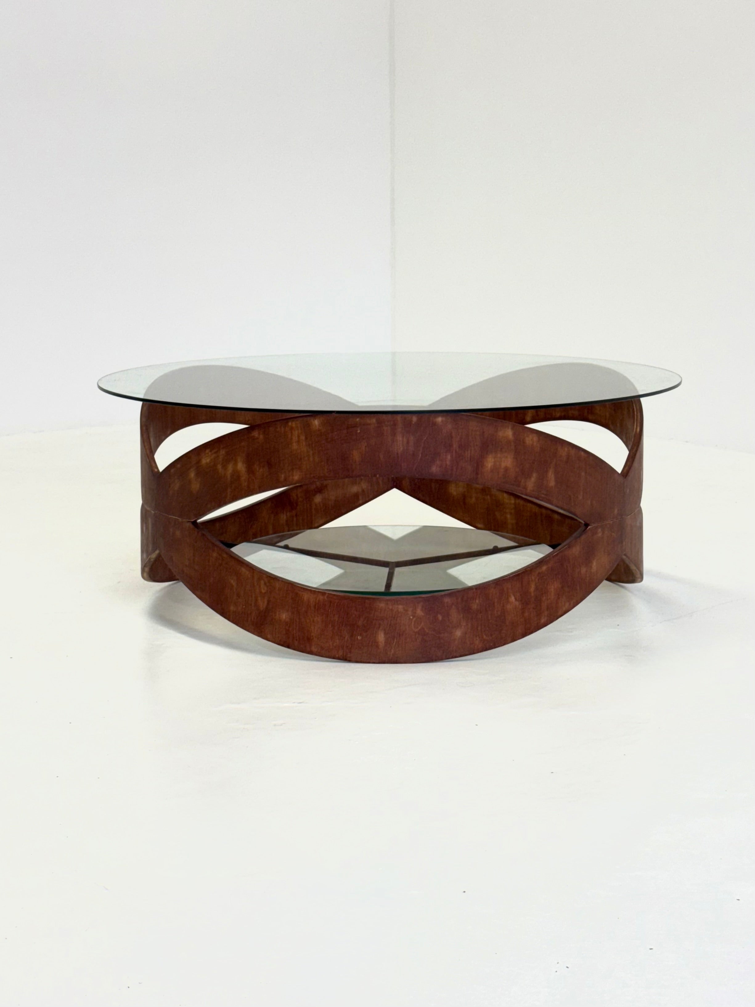 Vintage_round_coffee_table_with_sculptural_wooden_frame