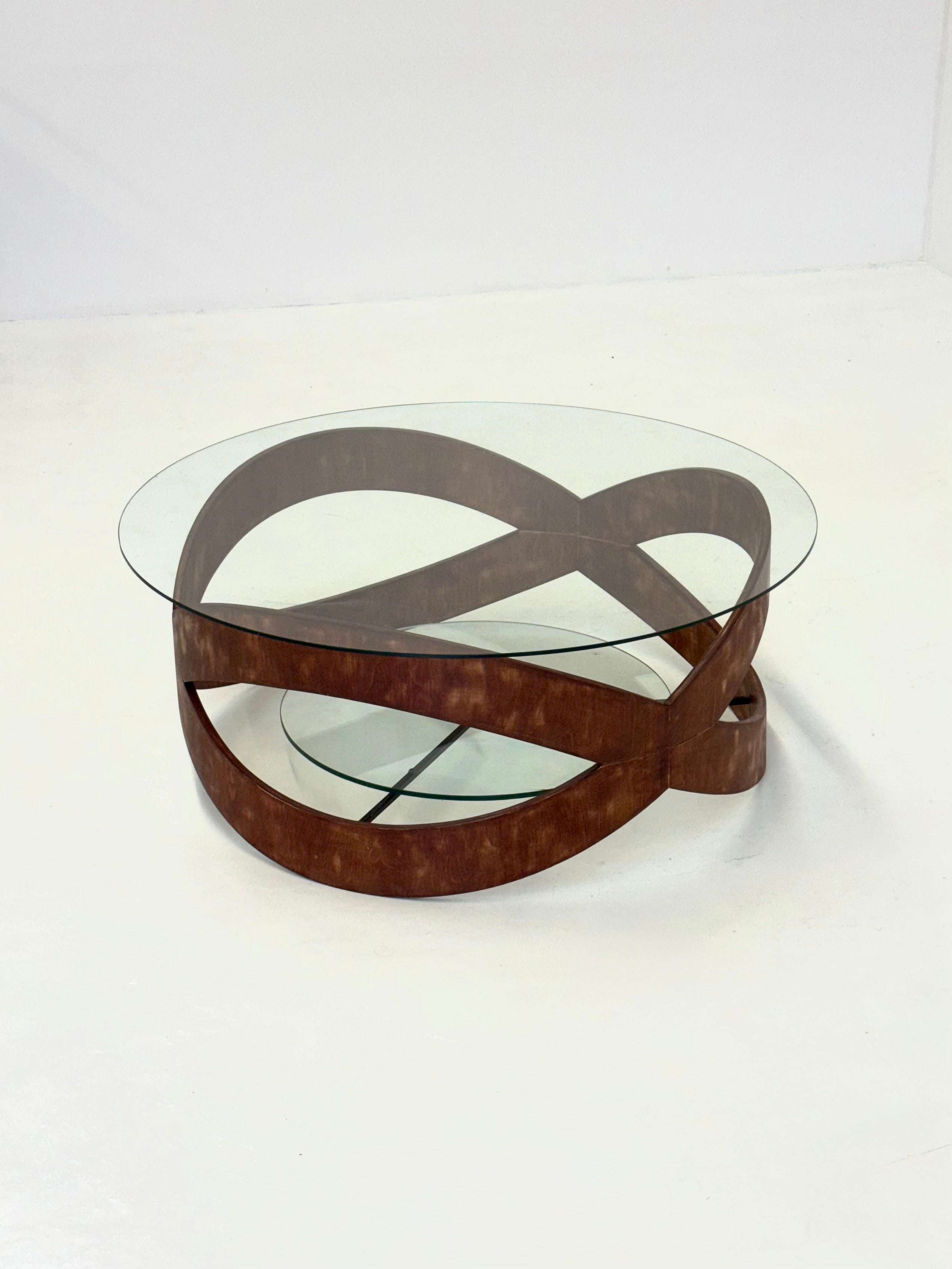 Vintage_round_coffee_table_with_sculptural_wooden_frame