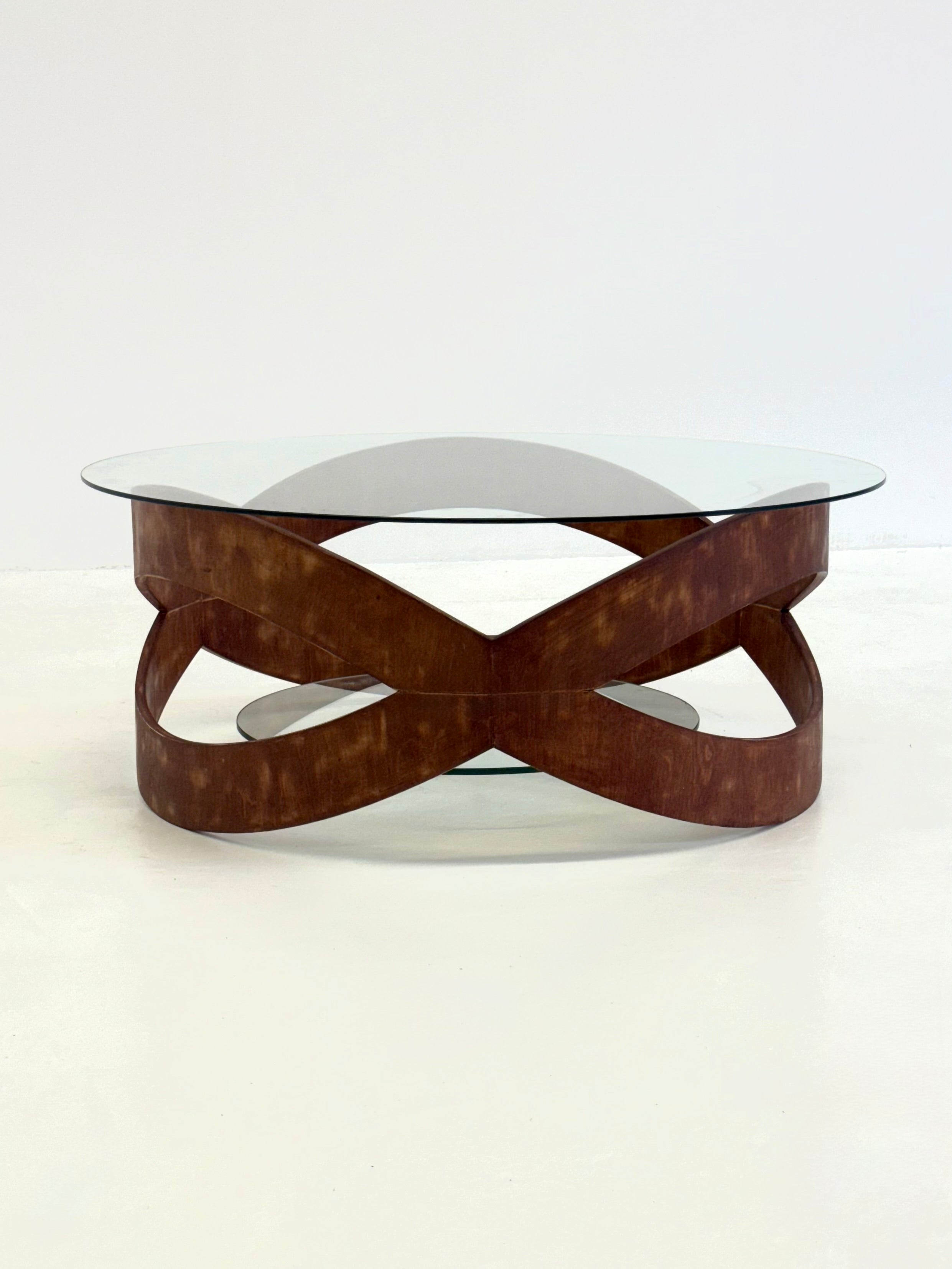 Vintage_round_coffee_table_with_sculptural_wooden_frame