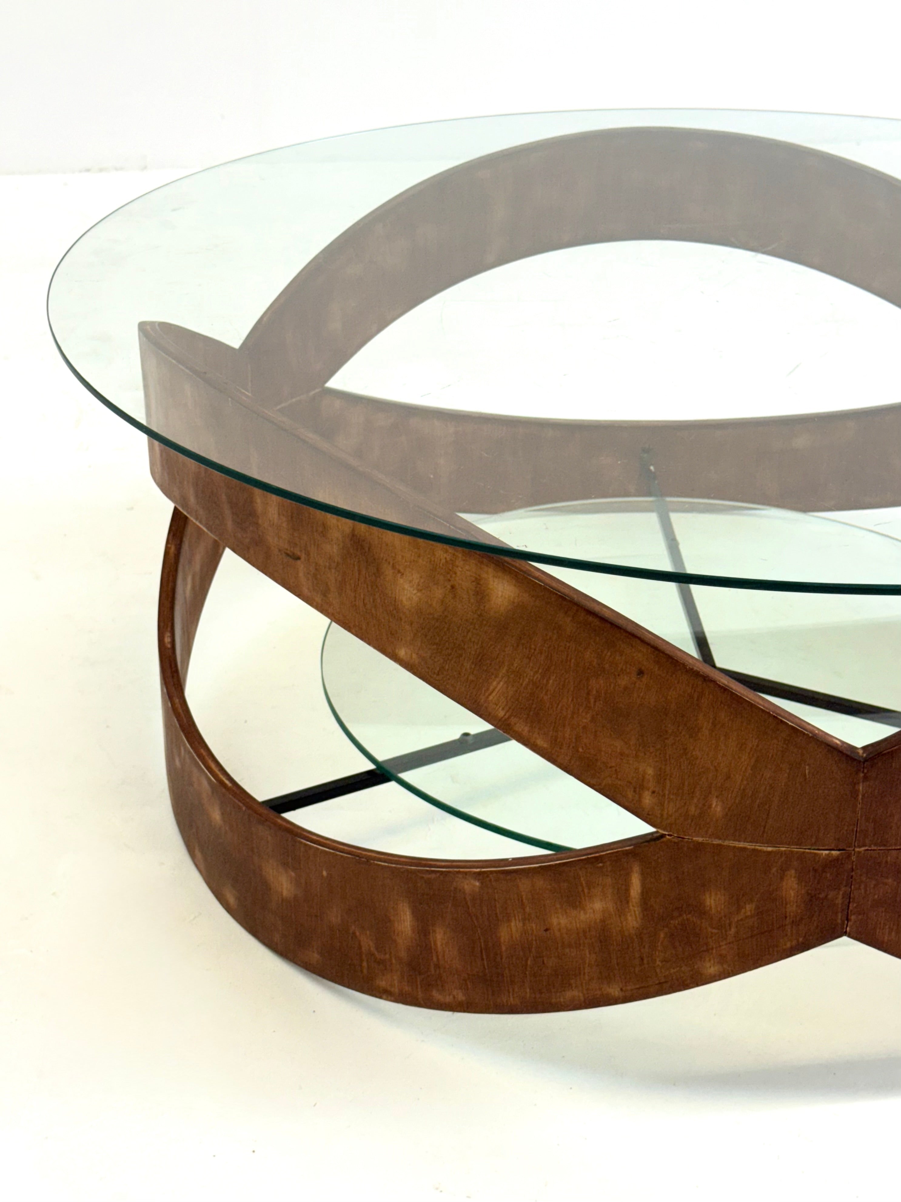 Vintage_round_coffee_table_with_sculptural_wooden_frame