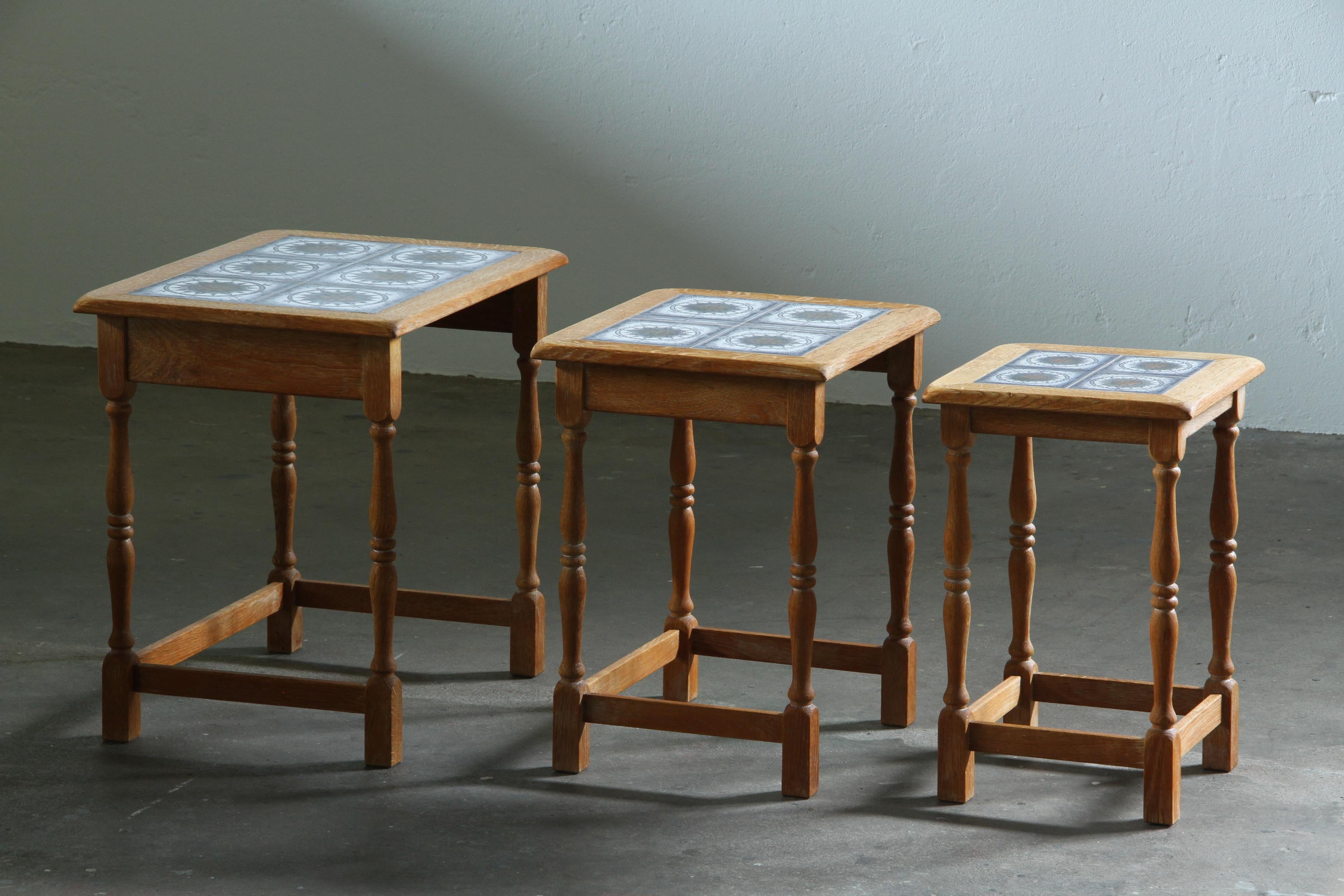 Set_of_3_Danish_Brutalist_Oak_Nesting_Tables_with_Blue_Ceramic_Tiles_in_the_Style_of_Henning_Kjærnulf,_1970s