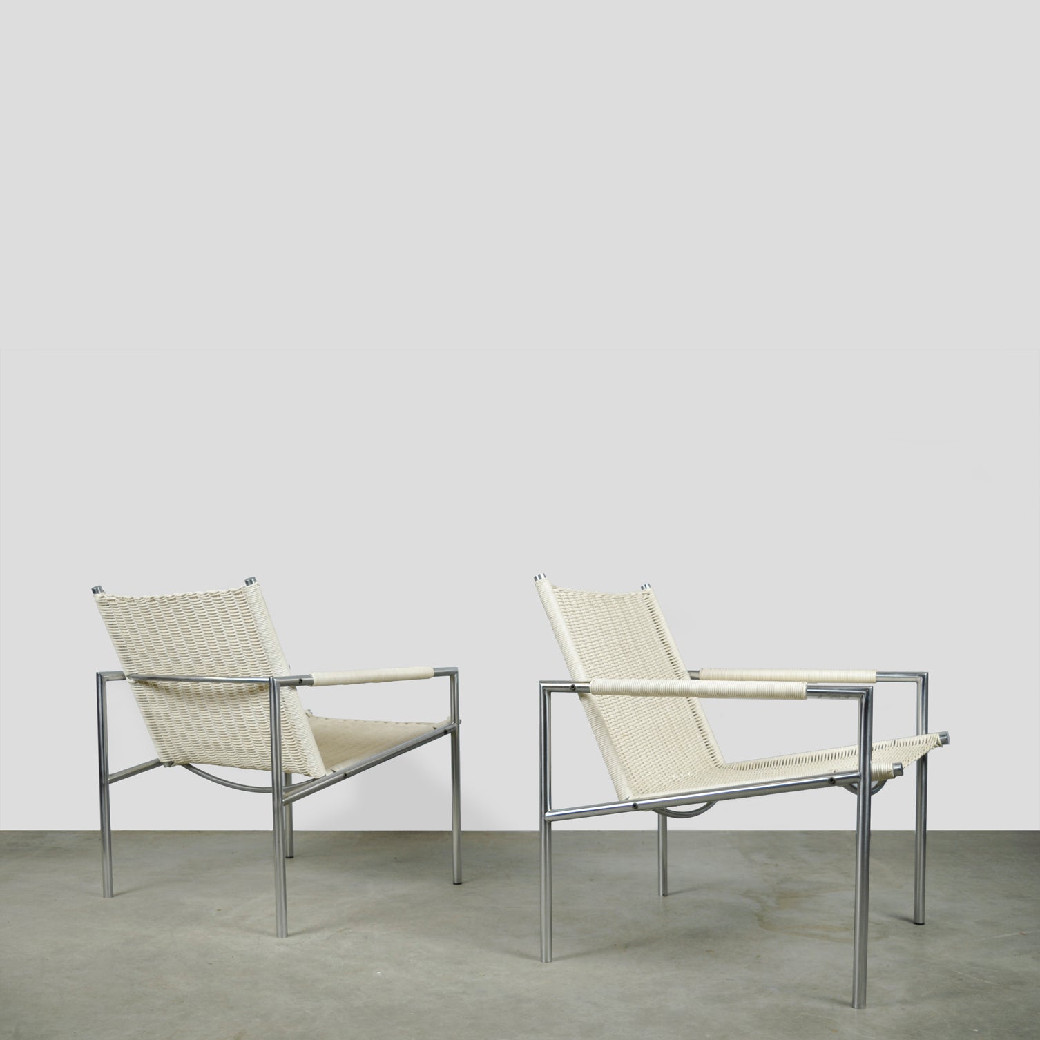 Set_of_2_Spectrum_rattan_armchairs_sz01_by_Martin_Visser,_Netherlands_1980s