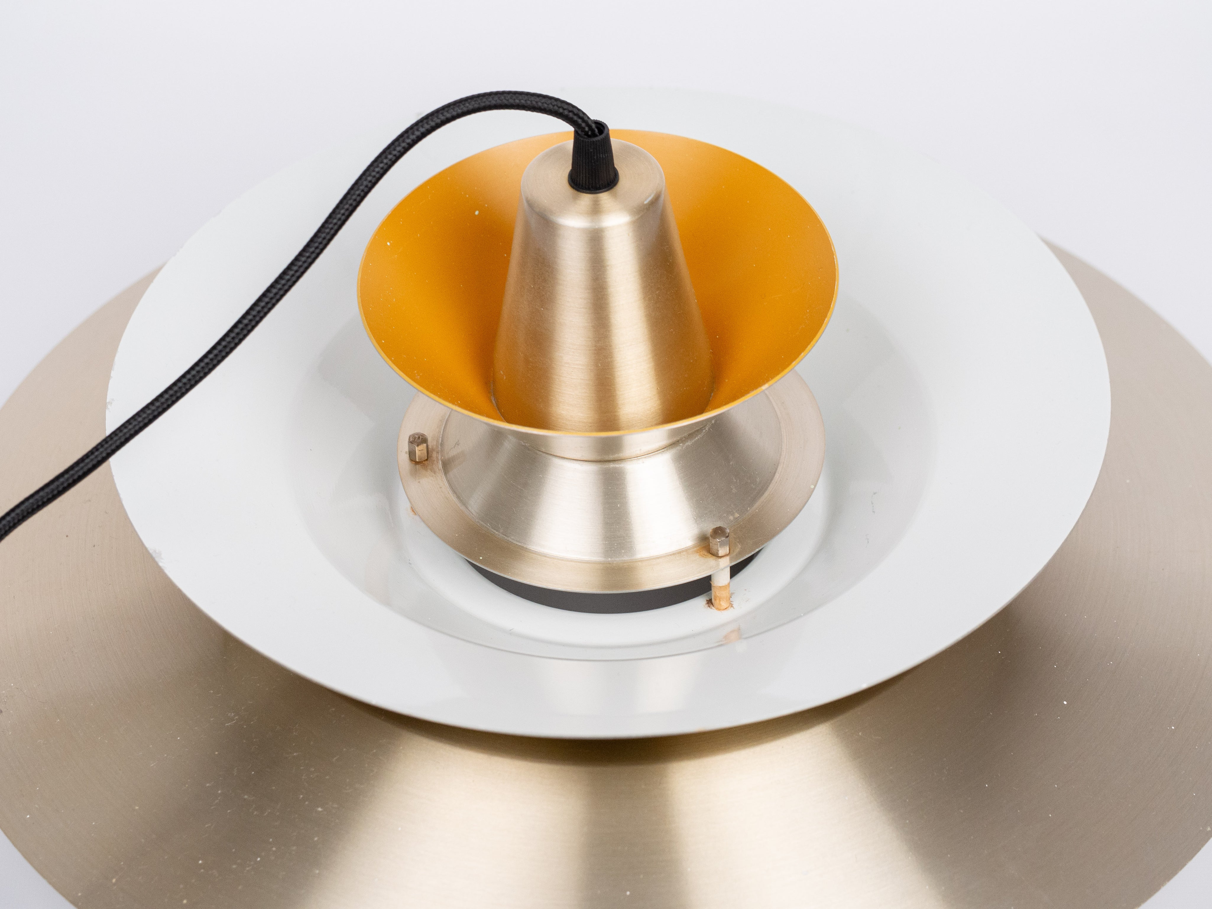 Scandinavian_Modernist_Multi-Layered_Brass_Pendant_Lamp_with_Concentric_Rings,_1960s