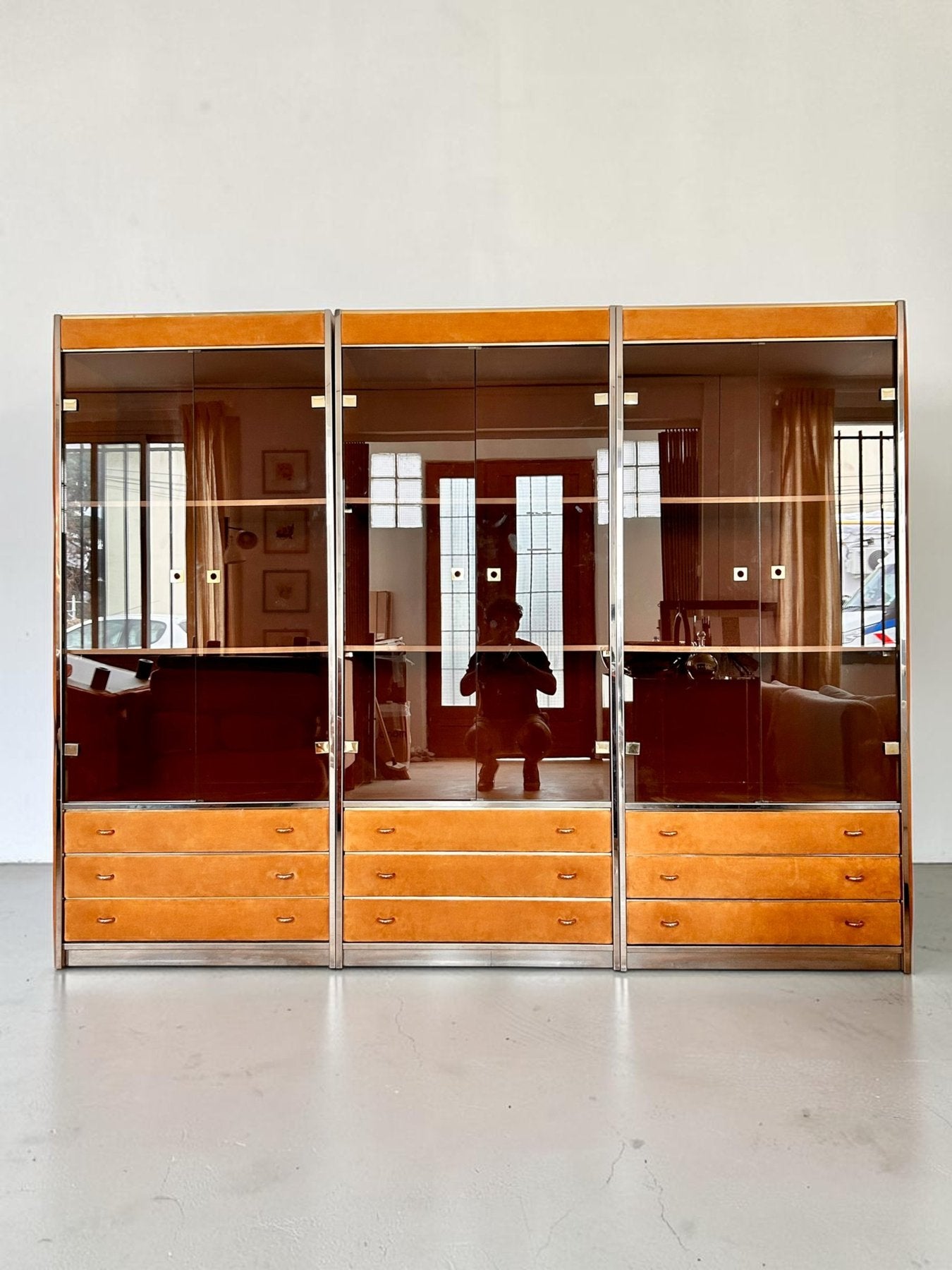 Three-Module_Display_Cabinet_in_Suede,_Smoked_Glass_and_Brass_in_the_Style_of_Willy_Rizzo,_Italy,_1970s