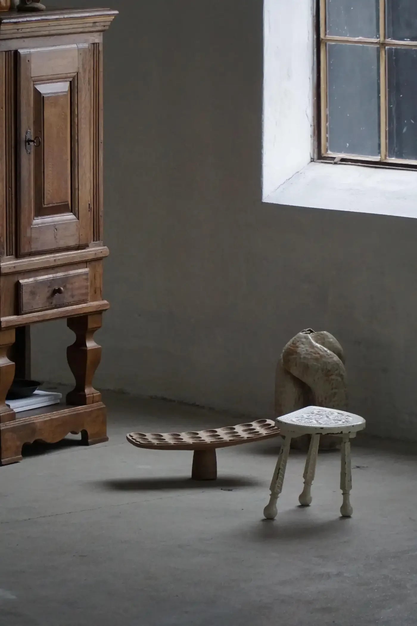 Wooden_Tripod_Stool_with_Carved_Details,_Rustic_Scandinavian_Design