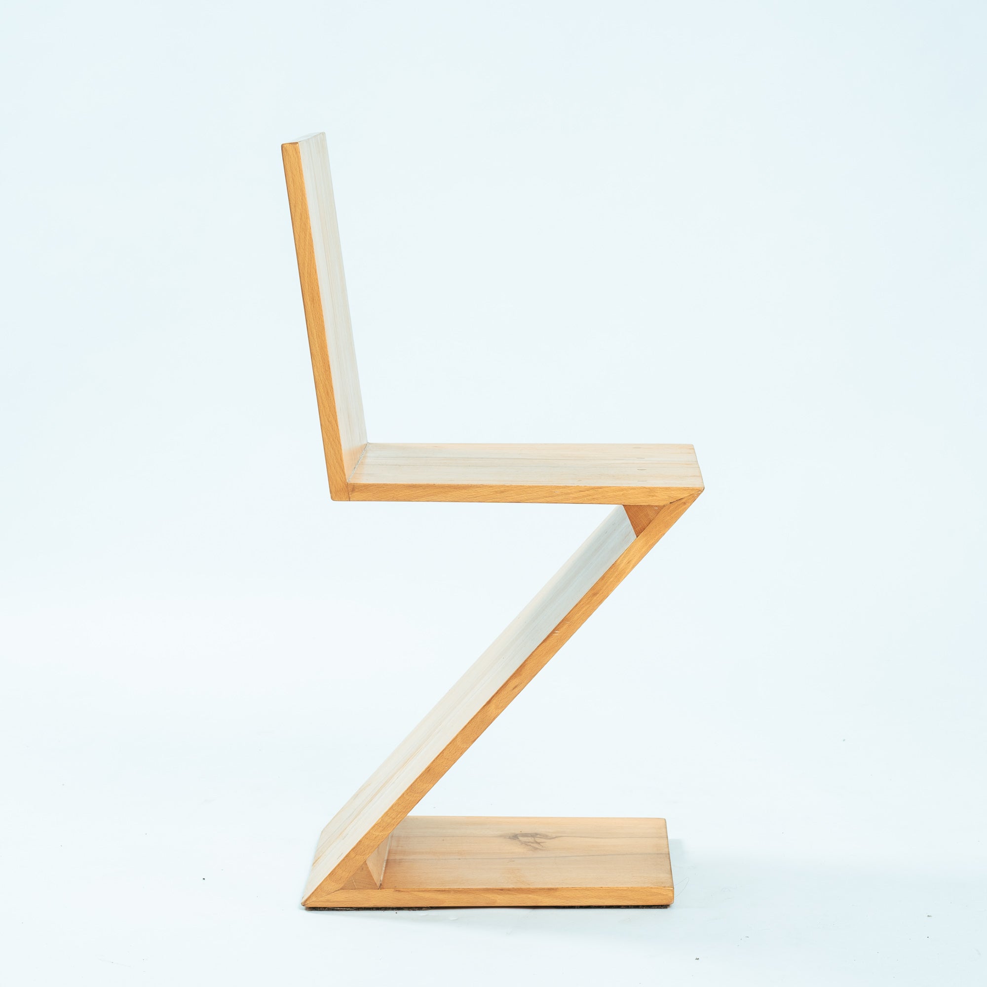 Set_of_4_Zig_Zag_Chairs_After_Gerrit_Rietveld,_Solid_Ash_Cantilever_Chair,_Dutch_De_Stijl_Design